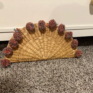 Vibrant Woven Clutch with Pom Poms